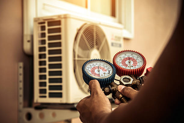 Professional Air Conditioning Service technician working in Rush City, MN